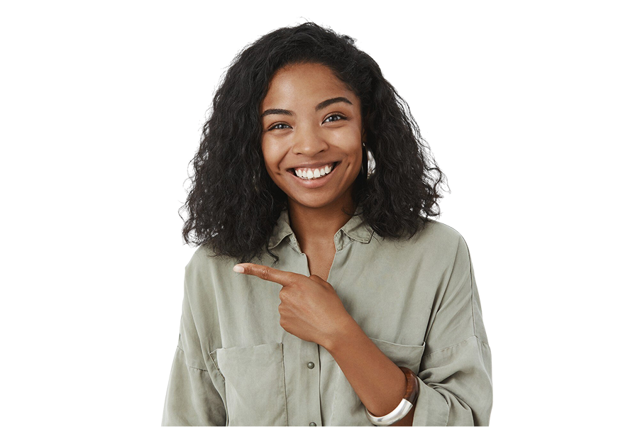 waist up amused friendly looking charming dark skinned woman with curly hairstyle grey shirt pointing left smiling joyfully 1 1 - Dr. Tim Silegy OMFS